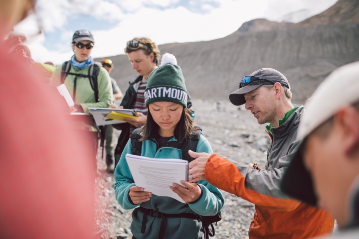 On the last day on the Athabasca Glacier, the students map the forefield where the ice has melted. Associate Professor Erich Osterberg answers a question from Angela Li ’20.