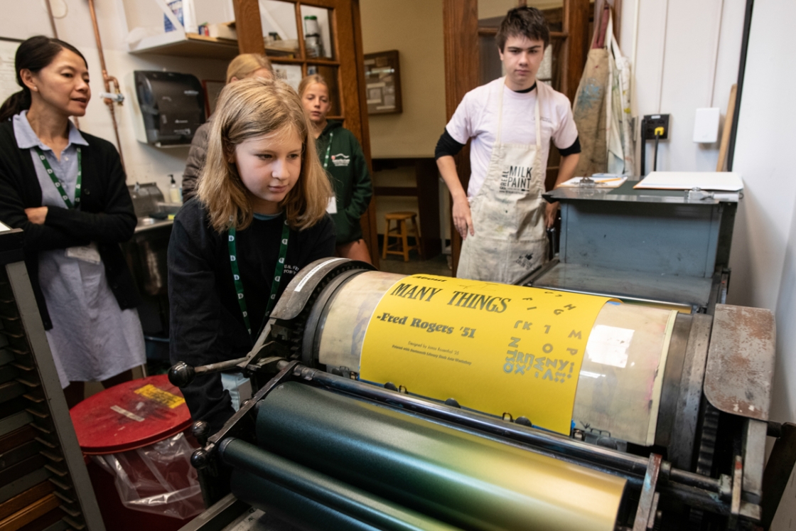 Dartmouth families use the printing press in the library