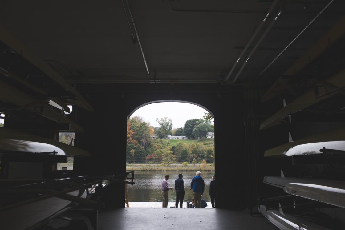 The inside of the Dartmouth boathouse looking out towards the dock and river
