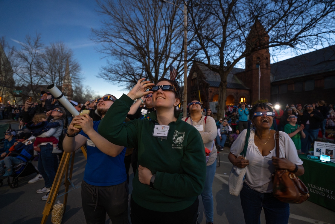 Dartmouth graduate students look at the eclipse