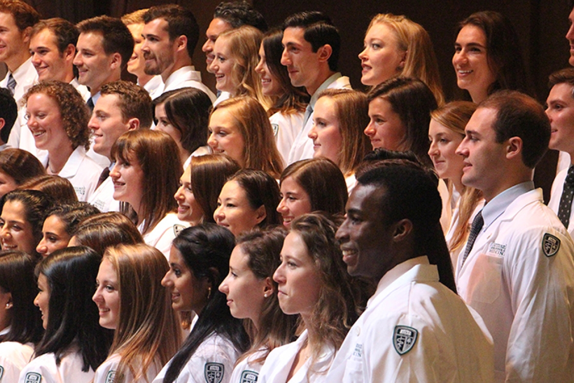 medical students in white lab coats