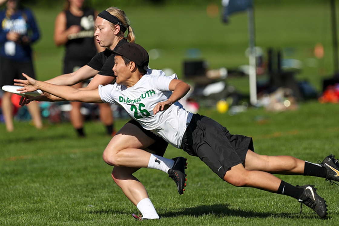 Caitlyn Lee, No. 26, dives for the Frisbee at the USA Ultimate DI Championships.