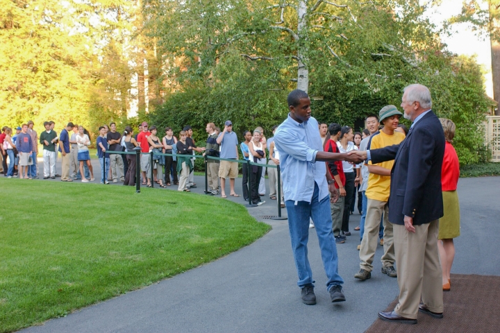 Susan and James Wright greet a line of students.