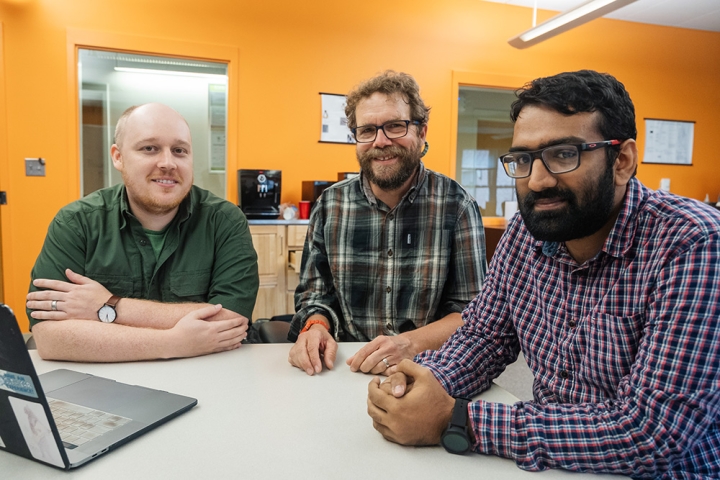 Dartmouth graduate students Ira Ray Jenkins, left, and Prashant Anantharaman, right, developed security hardware with support from Professor Sean Smith. 