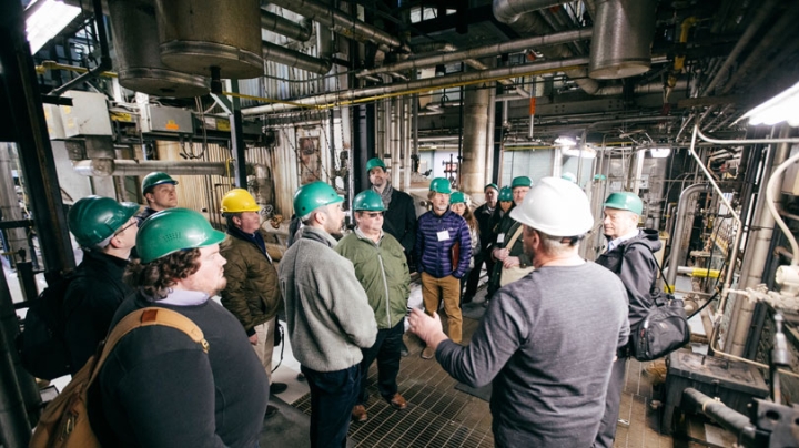 Representatives tour the College’s existing heating plant