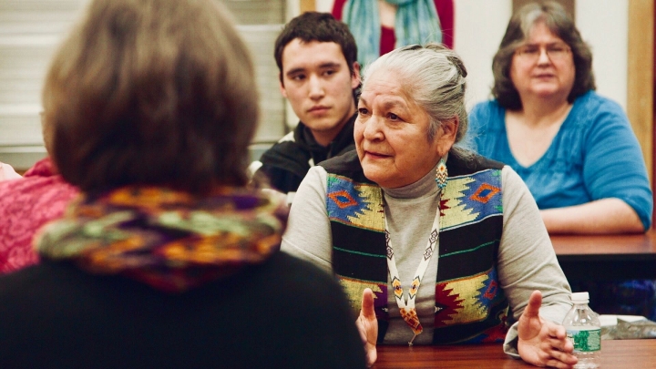 In this scene from Dawnland, Georgina Sappier-Richardson shares her story at a Truth and Reconciliation Commission community visit. At 2 years old, Sappier-Richardson was removed from her home and Passamquoddy community by Maine's child protection service