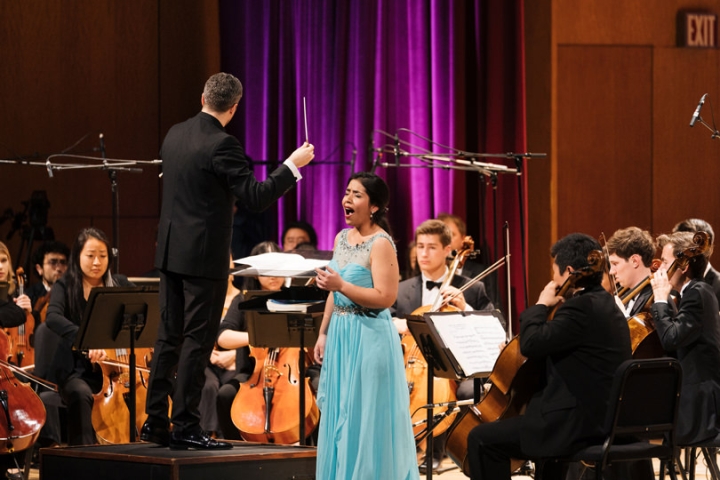 The Dartmouth Symphony Orchestra, with soprano soloist Sasha Gutierrez, performs during the ceremony.